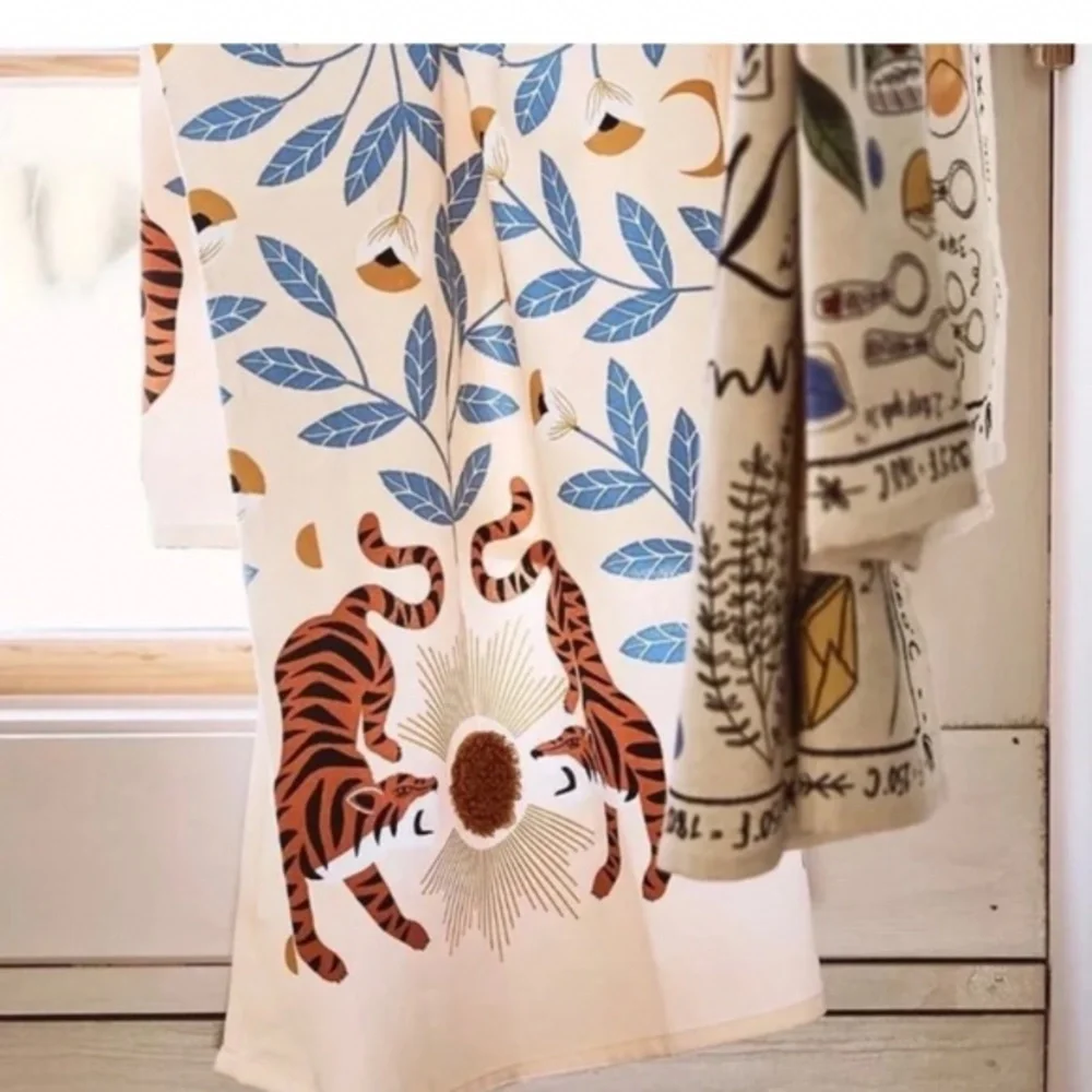 Anthropologie Cream Tea Towel with Blue Leaves and Brown Tigers